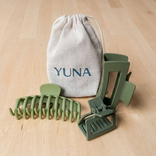 Image hair clip green in front of profile.