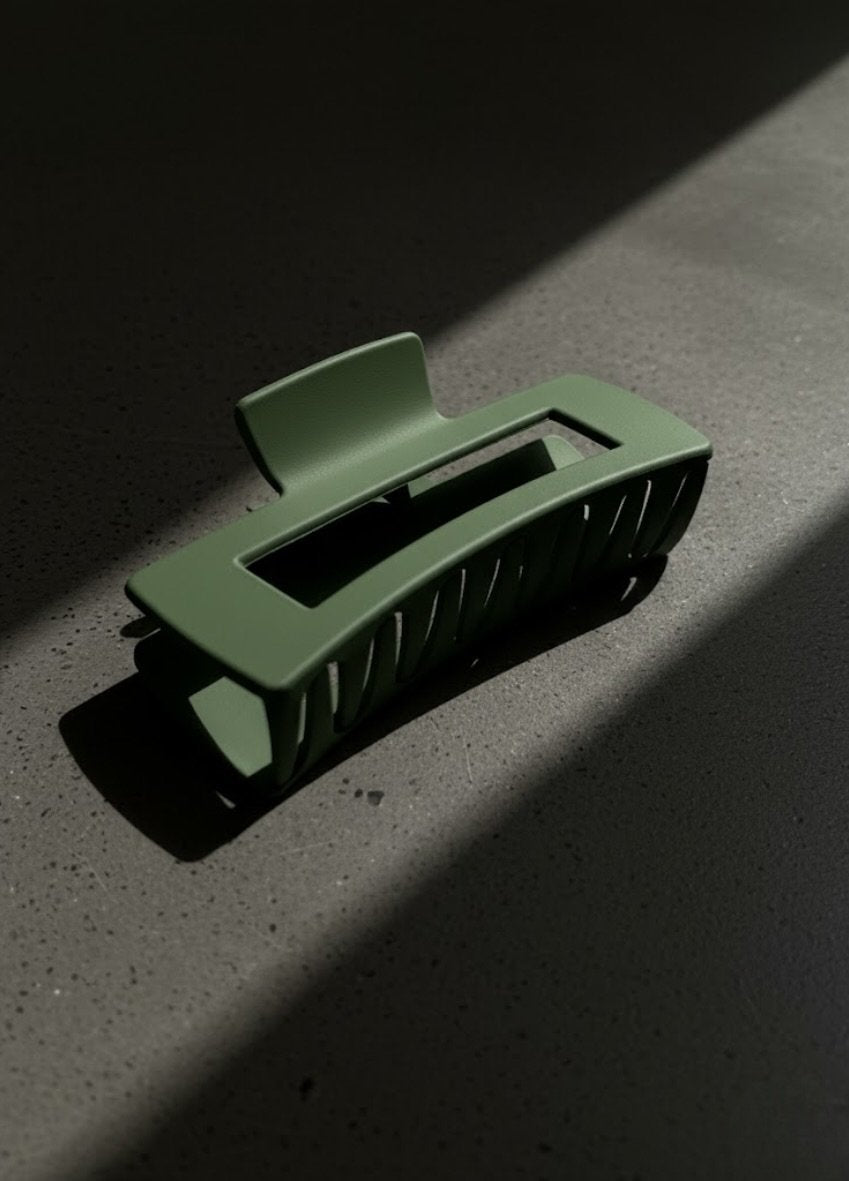 Close-up of Hub Forest green hair clip texture